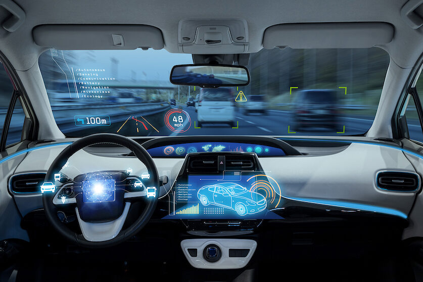 empty cockpit of vehicle, HUD(Head Up Display) and digital speedometer. autonomous car. driverless car. self-driving vehicle.